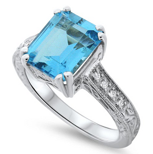 Blue Topaz and Diamond Ring